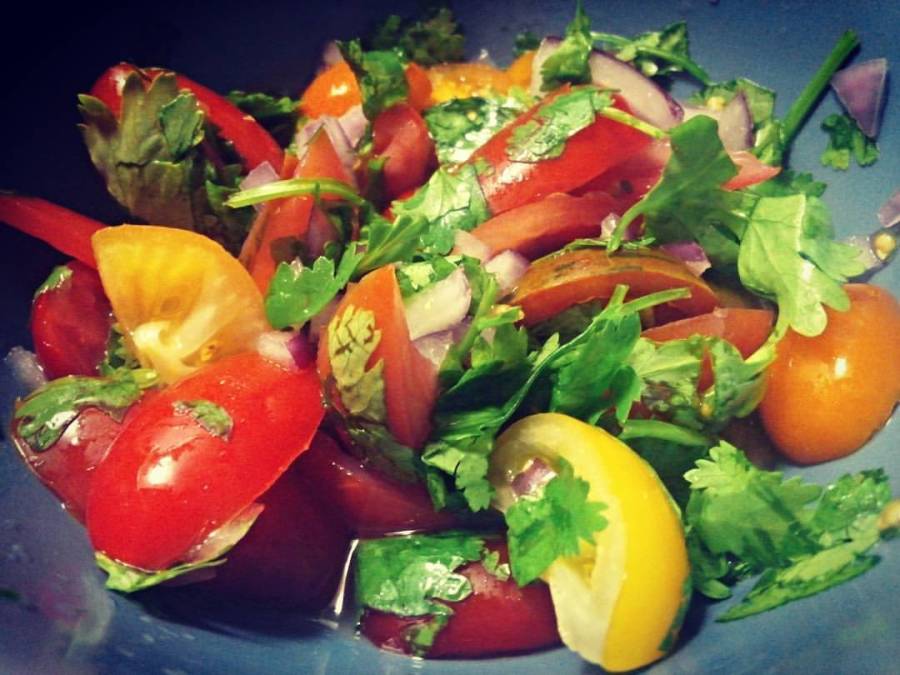 A light Heirloom Tomato, Red Onion and Cilantro salad for the hot summer!